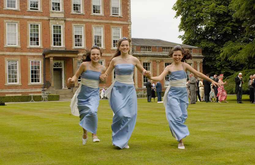 Bridesmaids on lawn at Middlethorpe Hall