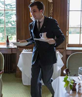 Guests at luncheon in Oak Dining Room at Middlethorpe Hall Guests at luncheon in Oak Dining Room at Middlethorpe Hall