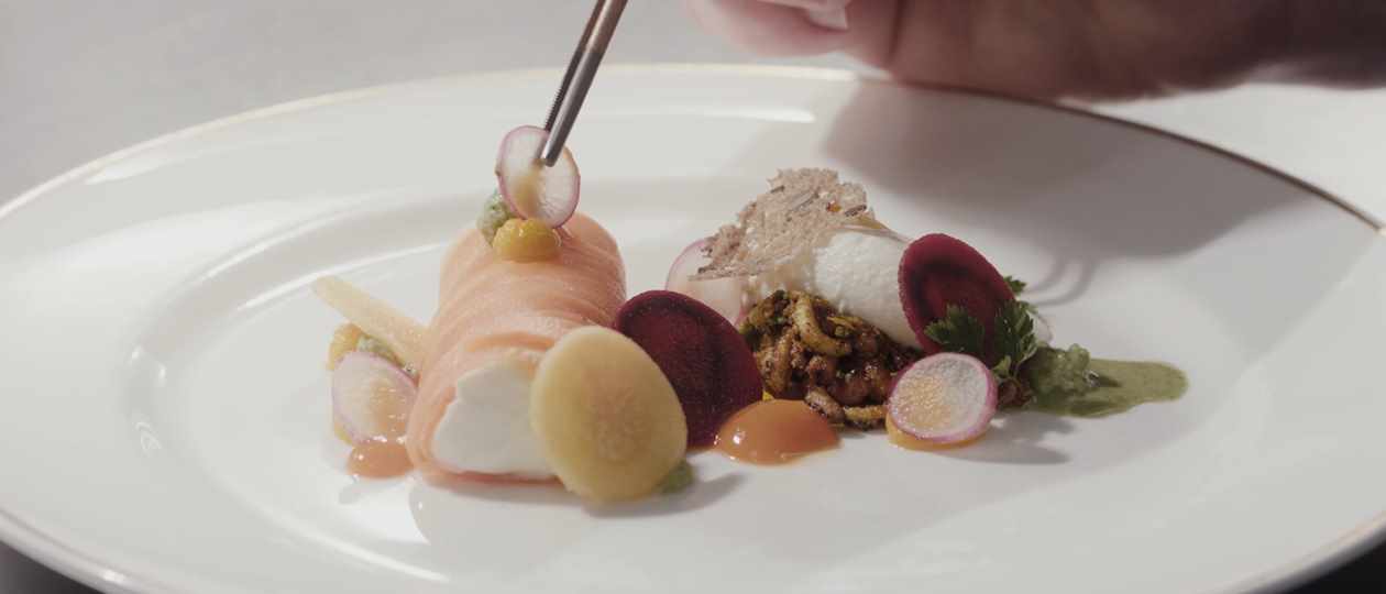 Finishing touch to food dish at Middlethorpe Hall Finishing touch to food dish at Middlethorpe Hall