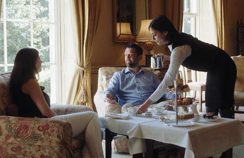 Guests being served afternoon tea at Middlethorpe Hall